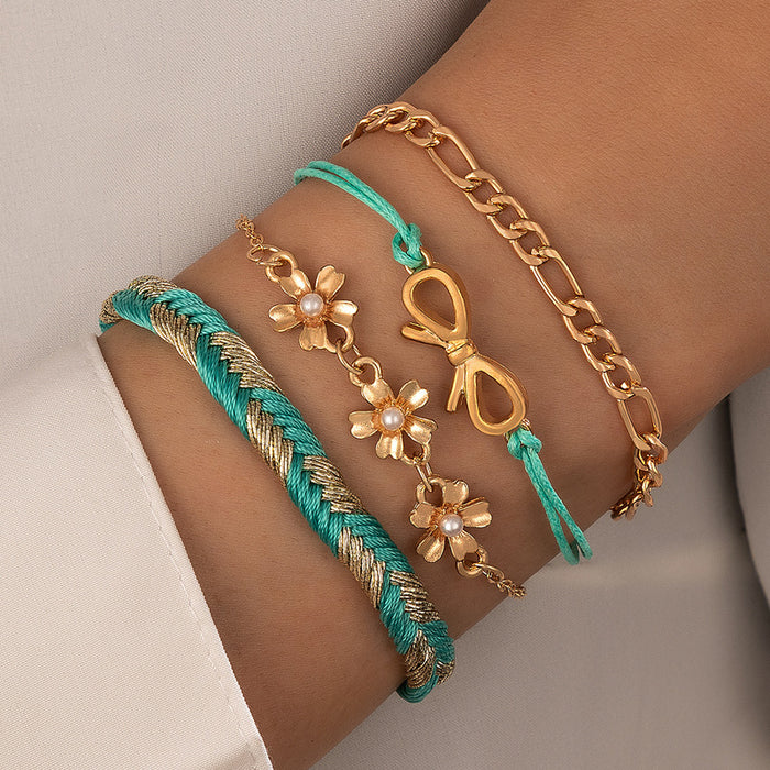 Conjunto de pulseras en capas con perlas y lazos y diseño de cordón trenzado