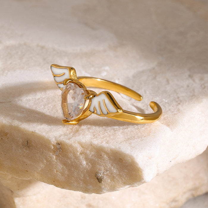 Anillo abierto de acero inoxidable con forma de corazón y alas de ángel y circonitas en oro de 18 quilates (nuevo diseño)