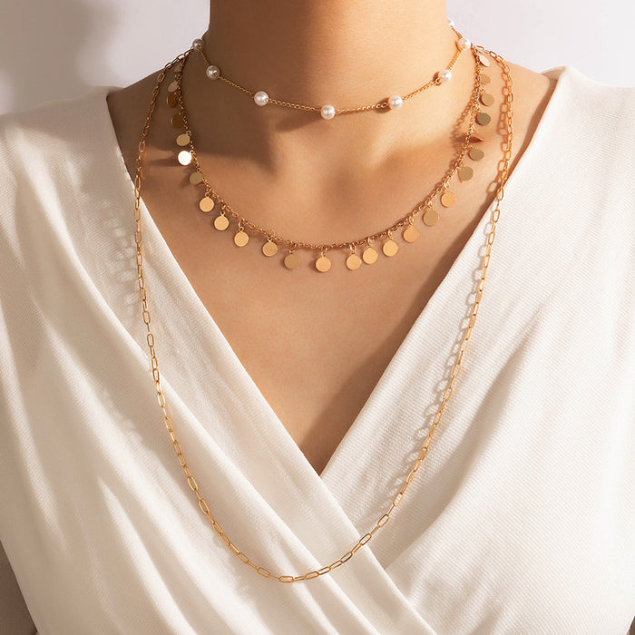 Pearl and Metal Multi-Layer Necklace with Geometric Round Disc Design