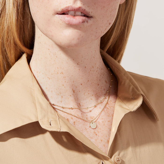 Collar con colgante doble bañado en oro de 18 quilates y cuentas redondas: joyería de moda para mujer