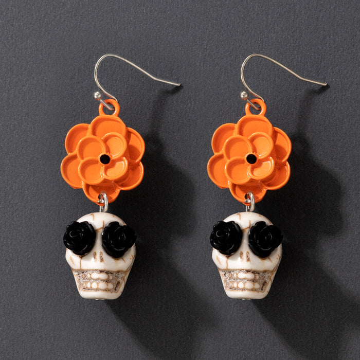 Pendientes de cuerda elástica con cuentas de arroz de colores y calaveras de Halloween