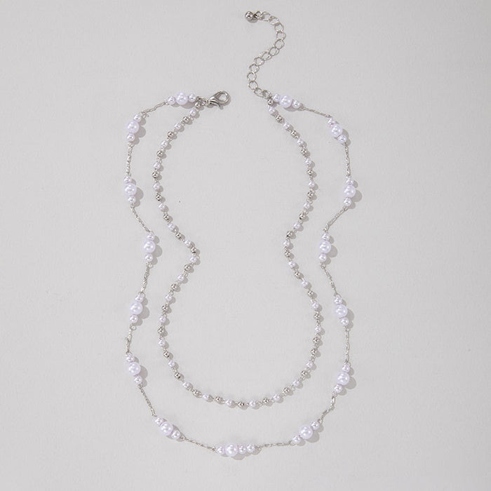 Double Layered Pearl and Metal Chain Necklace - Sophisticated and Trendy Design