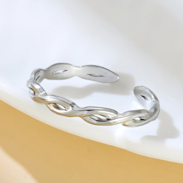 Wholesale stainless steel and titanium steel twisted openwork rings