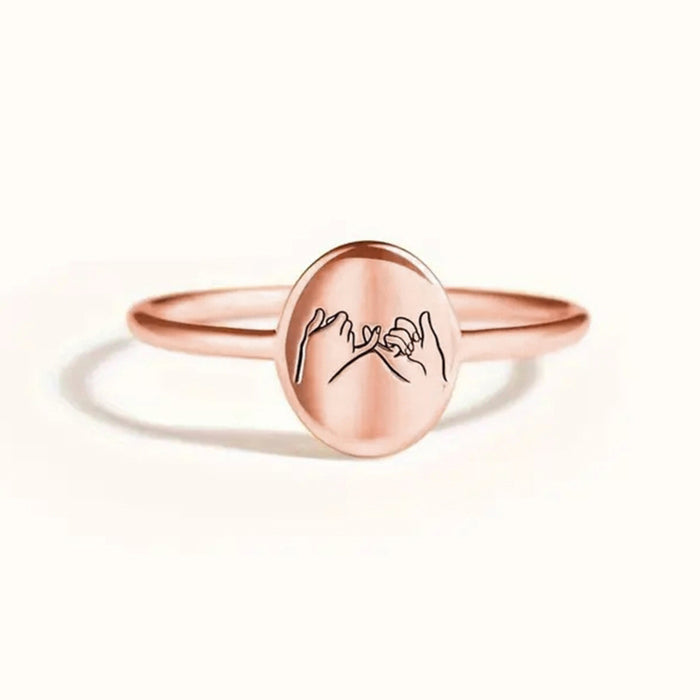 Women's geometric oval laser engraved ring