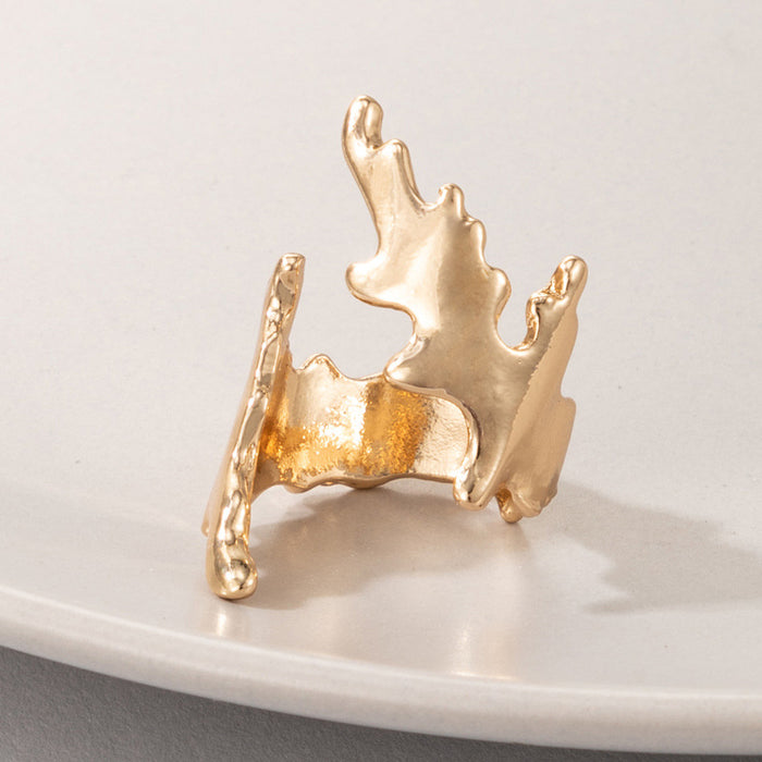 Irregular geometric gold ring with leaf opening