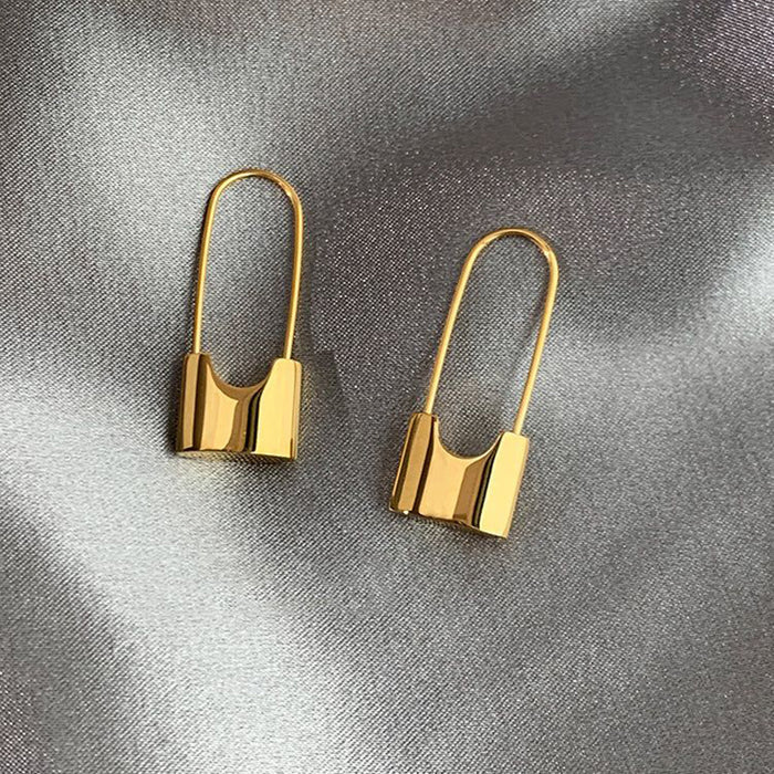 Pendientes de estilo moderno y metálico, pendientes de diseño de moda.