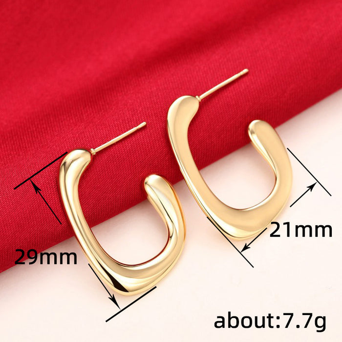 Gold geometric earrings Metallic cool style hoop earrings
