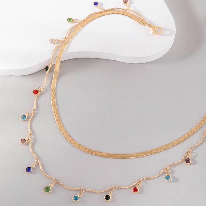 Collar de doble capa con piedras preciosas artificiales: elegante cadena de oro para mujer