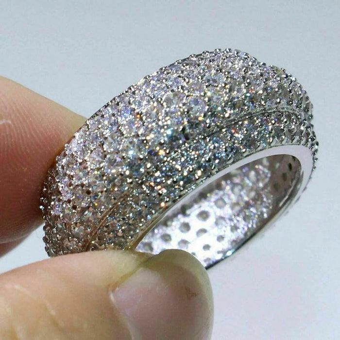 Anillo de propuesta con diseño de brazo torcido exquisito con diamantes de imitación de cuatro garras