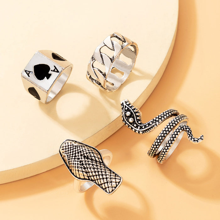 Exaggerated snake-shaped geometric spade A ring set