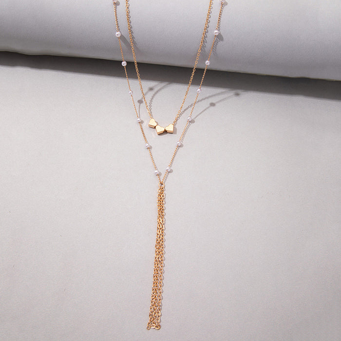 Dual Layered Heart Pendant Necklace with Pearl Tassel - Elegant and Feminine Accessory