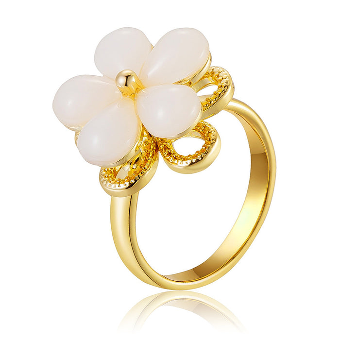 Wholesale cat's eye five-petal flower rotating ring