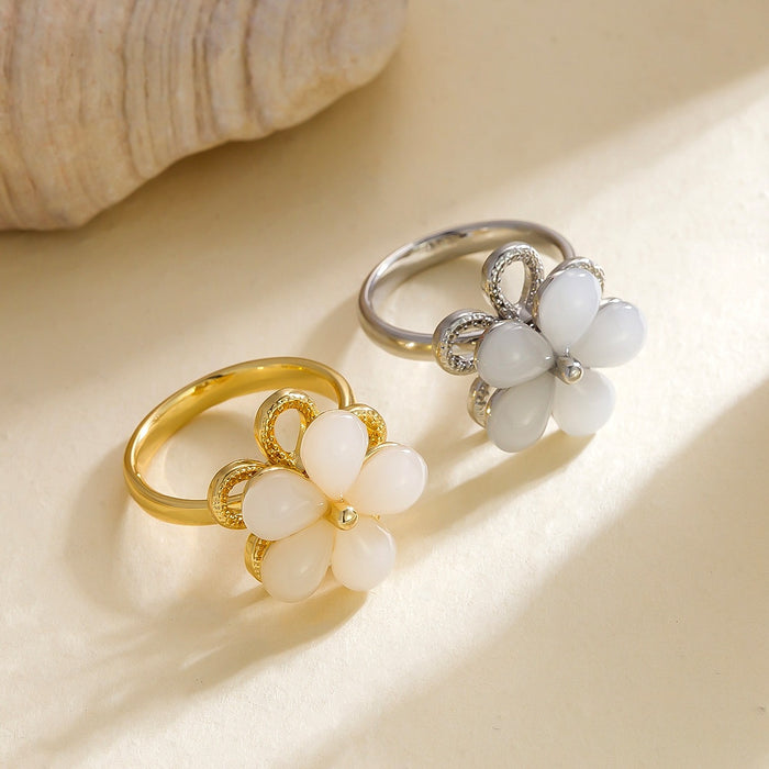 Wholesale cat's eye five-petal flower rotating ring