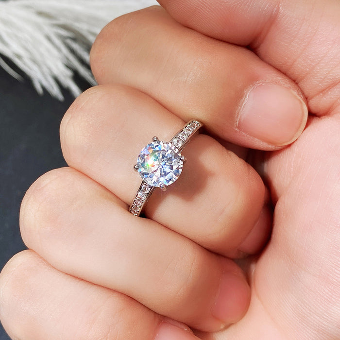 Anillo de bodas de cuatro garras con diamantes y anillo de compromiso de ocho corazones y ocho flechas