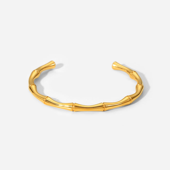 Pulsera abierta con diseño de bambú: joyería de moda de acero inoxidable bañada en oro de 18 quilates