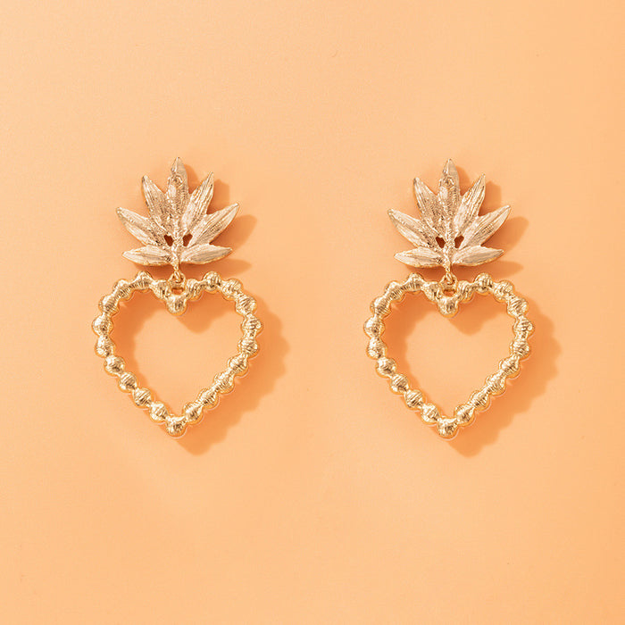 Pearl heart earrings with diamond leaf studs