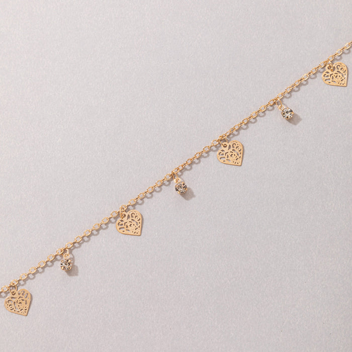 Flower and Heart Charm Anklet with Geometric Hollow Design