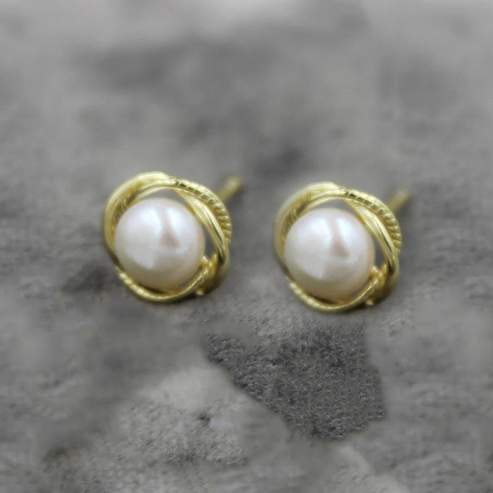 Imitation pearl earrings floral twist earrings