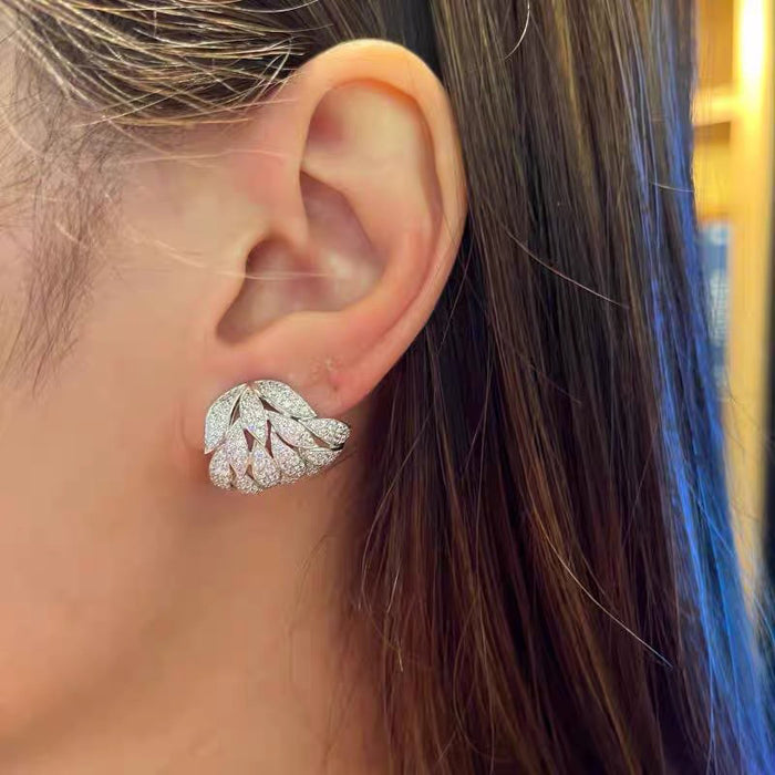 Pendientes de hojas de moda con microincrustaciones de circonitas