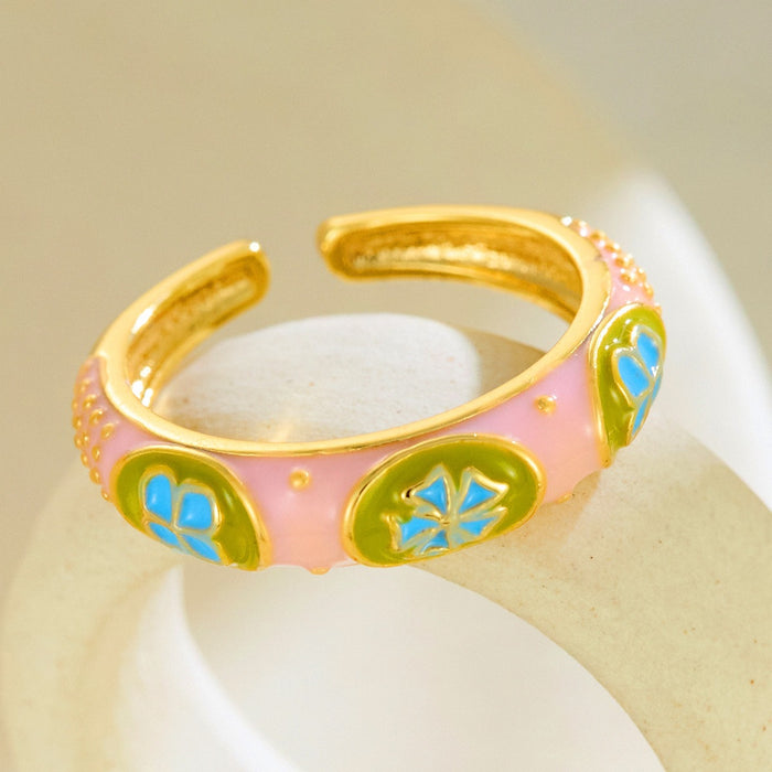 Wholesale dripping four-leaf clover open rings