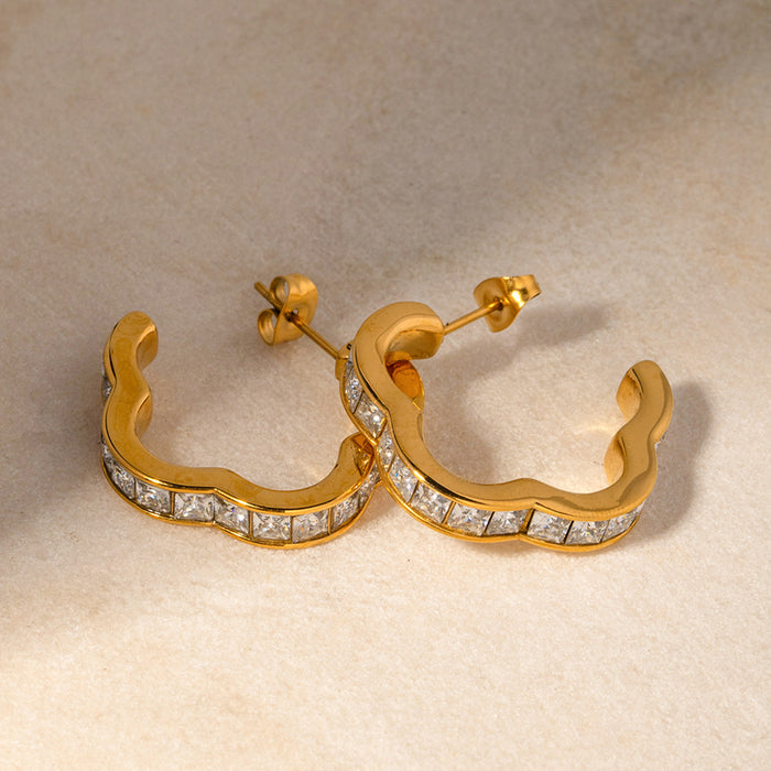 Pendientes largos ovalados pulidos de acero inoxidable y oro de 18 quilates: joyería minimalista de acero y titanio con forma de gota de agua