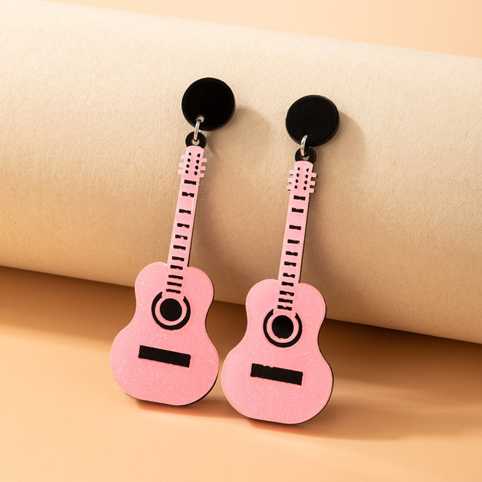 Pendientes de guitarra con purpurina de resina rosa, pendientes geométricos irregulares