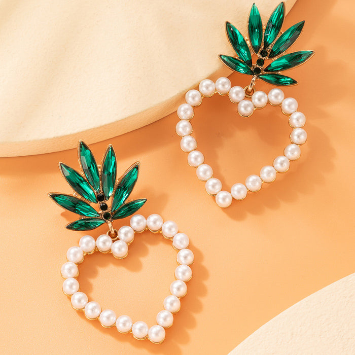 Pearl heart earrings with diamond leaf studs