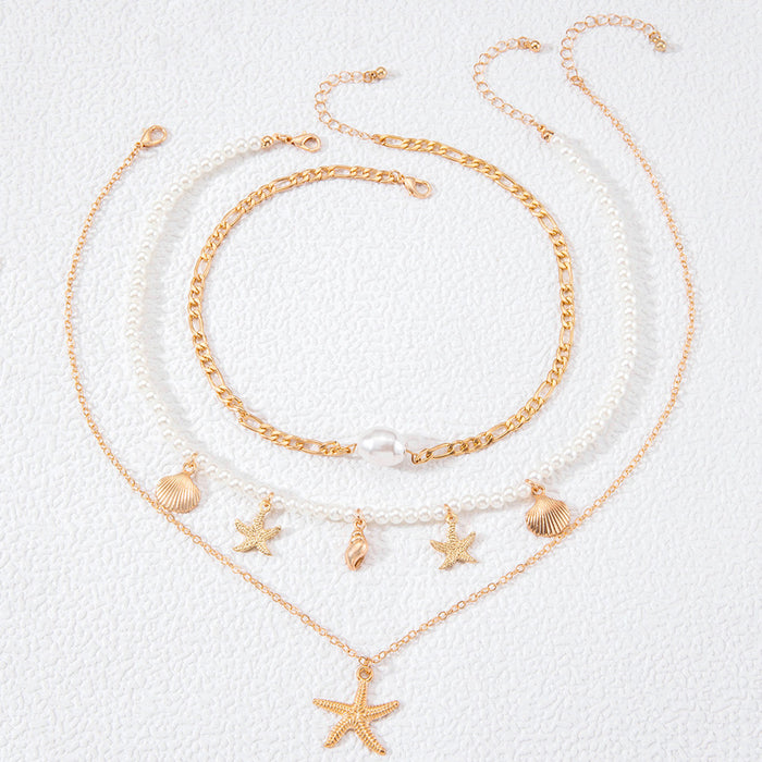 Layered Beach Necklace with Faux Pearls, Starfish, and Shell Charms - Retro Vacation Jewelry for Women