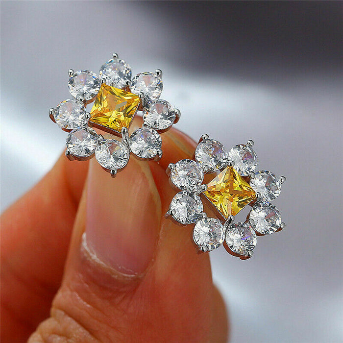 Pendientes de flor hueca con microincrustaciones de diamantes amarillos y circonitas para mujer