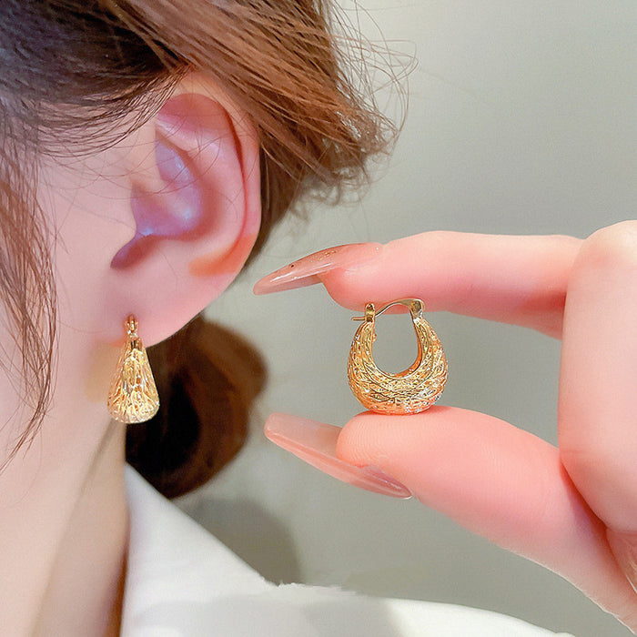 Hollow U-shaped earrings, light luxury and exaggerated metallic earrings