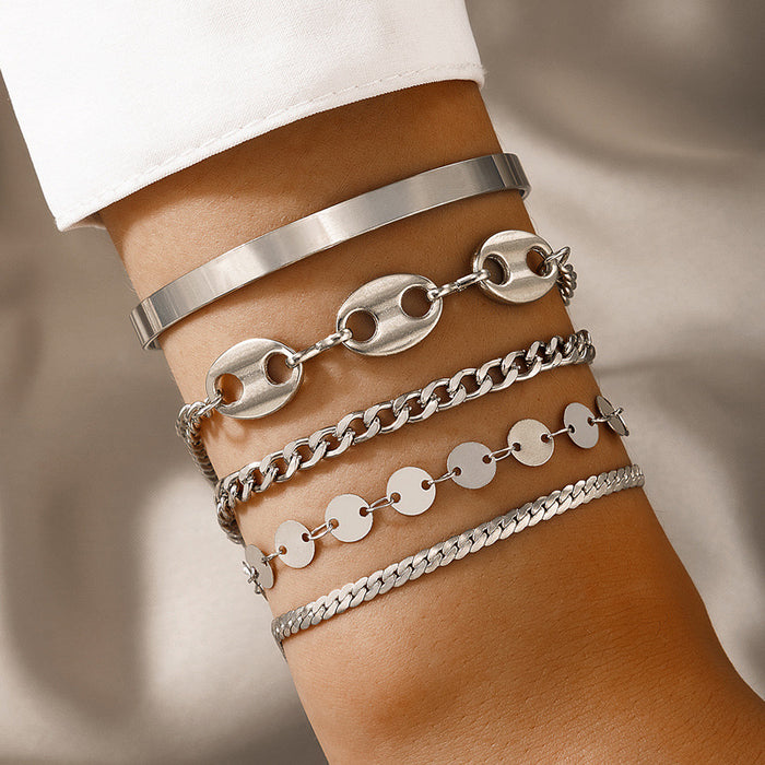 Conjunto de brazaletes estilo punk: brazalete de cinco piezas con cadena circular geométrica