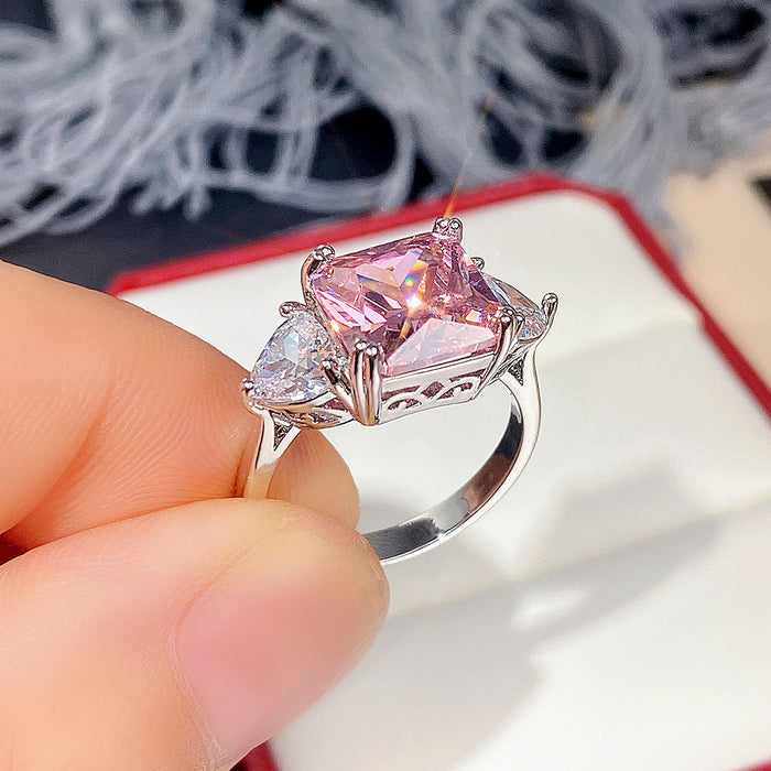 Anillo princesa cuadrado con ocho corazones y ocho flechas de circonita rosa