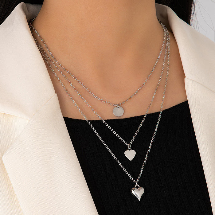 Silver Multi-Layered Heart Necklace - Elegant and Hip-Hop Inspired Design