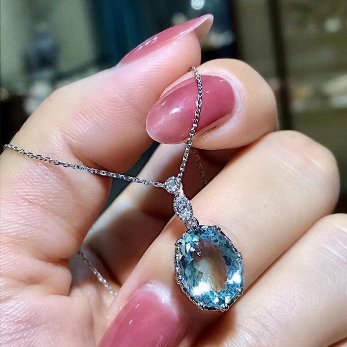 Light blue topaz inlaid zircon pendant necklace