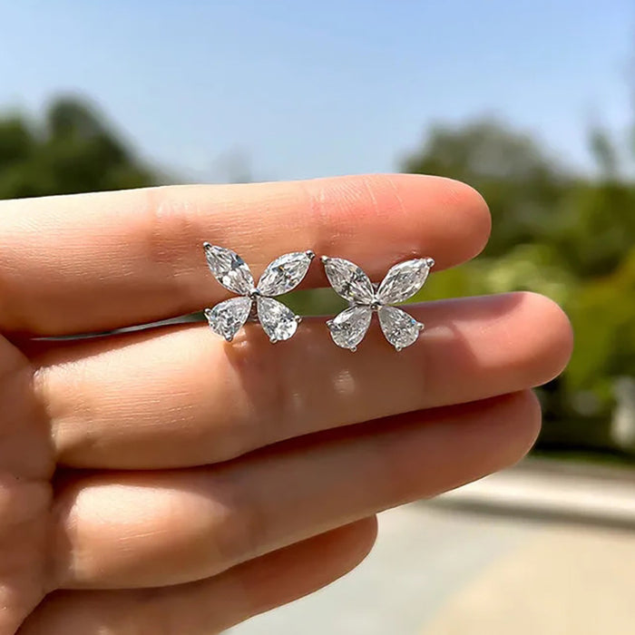 Exquisitos mini pendientes de gota de agua con forma de ojo de caballo y pequeños pendientes de mariposa y circonita