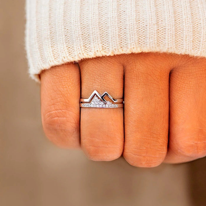 Anillo de pareja con forma de pico que late en el corazón, sencillo y versátil