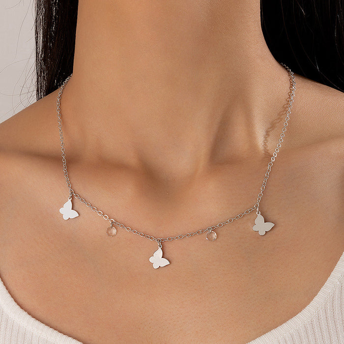 Collar con borlas de estrellas y lunas: cadena minimalista de varias capas para mujer