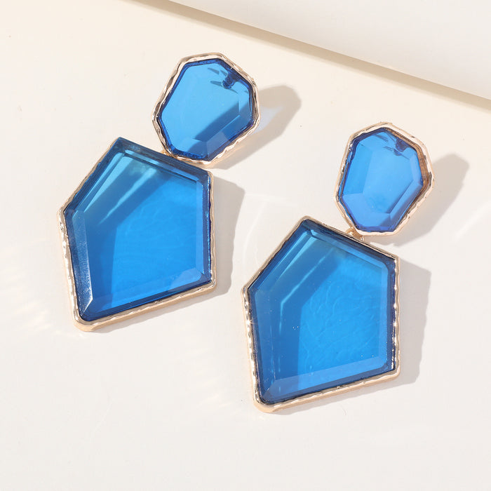 Pendientes geométricos de diamantes de imitación: colgantes exagerados para un look elegante