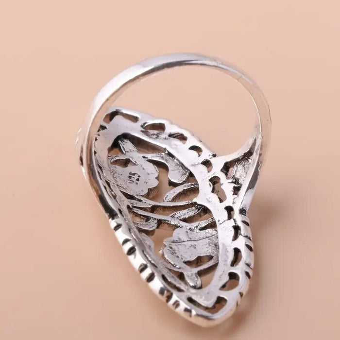 Patterned hollow flower ring alloy plum blossom fashion ring