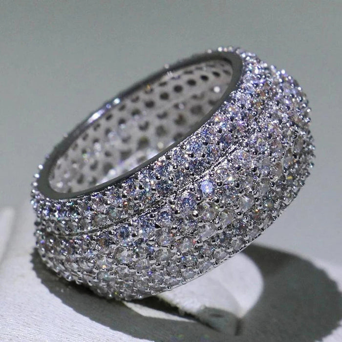 Anillo de propuesta con diseño de brazo torcido exquisito con diamantes de imitación de cuatro garras