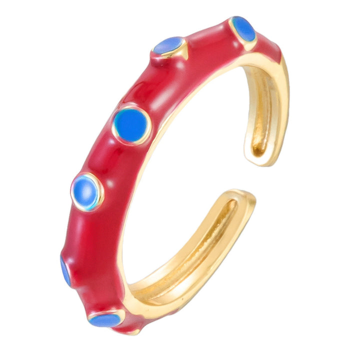 Wholesale gold-plated copper rings with colored droplets and geometric open designs.