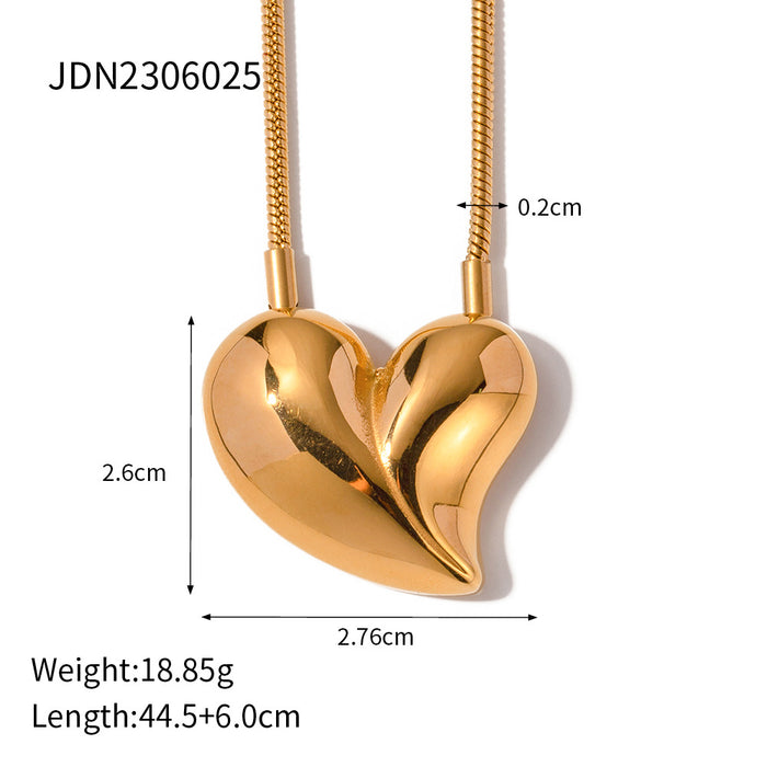 Nuevos pendientes de botón con forma de corazón exagerado chapados en oro de 18 quilates de estilo europeo: joyas que no se decoloran para mujeres