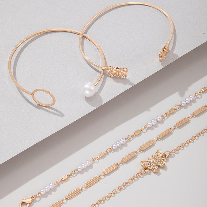 Conjunto de pulseras de cadena con forma de mariposa y perlas: cinco piezas de joyería con puños abiertos geométricos