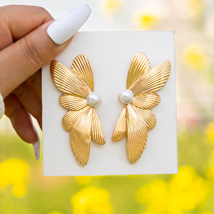 Pearl inlaid butterfly earrings geometric irregular alloy earrings