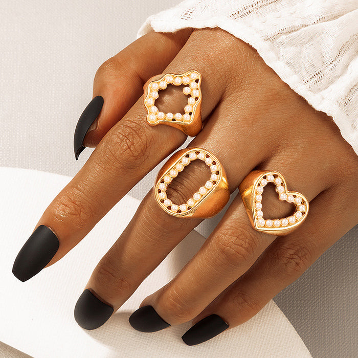 Hollow pearl inlaid irregular geometric O letter ring