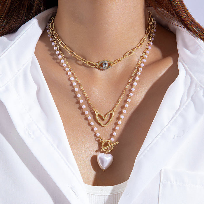 Multi-Layered Pearl and Heart Pendant Necklace