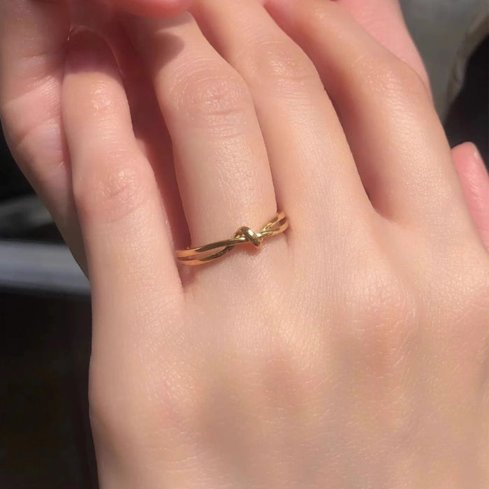 Wholesale stainless steel and titanium steel knotted and twisted ribbon rings