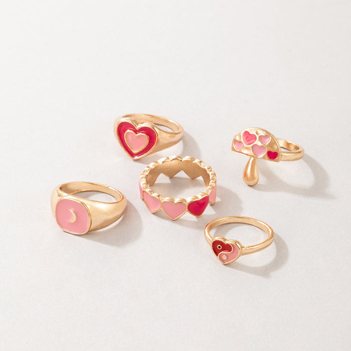 Anillo de 5 piezas con forma de hongo y corazón rosa con forma de gota de aceite de Tai Chi