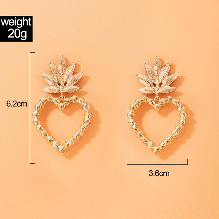 Pearl heart earrings with diamond leaf studs