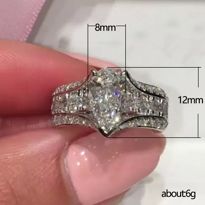 Anillo de diamantes simulados con circonita en forma de lágrima, anillo de bodas popular para mujeres